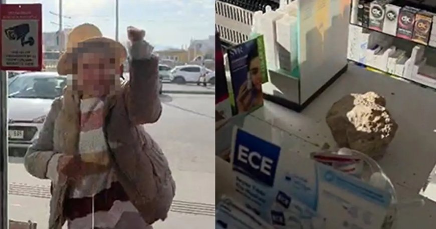 Fark ücreti vermek istemeyen kadın eczaneye taşla saldırdı